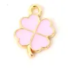 Nuevo color trébol trébol de cuatro hojas gota de aceite accesorios DIY accesorios para joyería llavero colgante para teléfono móvil venta al por mayor