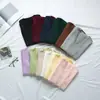 Fábrica de Punto al por Mayor 21 Colores Uniforme Jk Chaleco de Color Liso Estilo Japonés Cuello en V Jersey Chaleco de Punto Otoño e Invierno