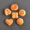 Nuevo producto serie moño de resina comida para jugar accesorios para snacks mini escena de cocina para crear adornos en miniatura al por mayor