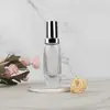Vaya, base de maquillaje líquida con cabezal de bombeo plateado en botella de vidrio, botella dispensadora de maquillaje de alta transparencia con fondo grueso curvo, material de embalaje para loción protectora