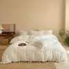 Juego de funda de edredón, sábana y sábana bajera de algodón de fibra larga de Xinjiang, teñido en hilo, jacquard, con amarres, grado A para maternidad e infancia, estilo hotel