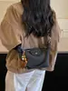 A bolsa de dumpling trançada popular deste ano para mulheres é a nova bolsa de ombro simples da moda de 2026, uma bolsa transversal de nicho estilo coreano