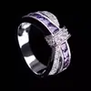 Anillo de lazo estilo europeo y americano Huajie anillo de nudo cruzado morado accesorios de joyería generosos al por mayor