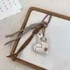 Coreano 2026 Nuevo Dibujo Animado Relleno de Algodón Pequeña Flor Hongo Llavero Moda Lindo Colgante para Bolso