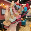 Llavero creativo de bricolaje con cabeza de Mickey a rayas brillantes tachonado de diamantes de imitación, lindo accesorio de dibujos animados para bolsos de mujer