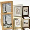 El fabricante suministra nuevos juegos combinados de marcos de fotos que se pueden colocar o colgar para exhibir fotos y decorar paredes, disponibles para venta al por mayor