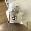Bolso de mano de cubo estilo nuevo para invierno 2025, bolso cesta elegante de gran capacidad, bolso de hombro cruzado retro personalizado