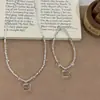 Cadena de eslabones con cuentas de moda versátil, colgante de gato transparente, collar, pulsera, personalizado, exquisito, estilo frío, joyería de alta gama para mujer
