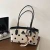 Nuevo bolso coreano de moda estilo lunares tipo baguette, a la moda y elegante, popular bolso de hombro y para llevar debajo del brazo para el trabajo, principios de otoño 2026
