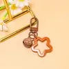 Llavero colgante de campana de pentagrama calado de colores Kit de material para abalorios hecho a mano DIY para accesorios de decoración de bolsas y orejas