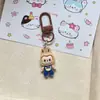 Mameluco Lindo, Mochila de Peluche, Llavero, Colgante Pequeño, Bolso de Estudiante Caricatura Femenino, Resplandor en la Oscuridad