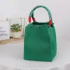 Bolsa de Férias Bolsa de Mão Feminina Bolsa Saco Feminina Estilo Moda Tricô Europeia e Americana Transfronteiriça Mais Vendida Bolsa de Mão Bolsa de Tricô Atacado