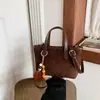 Bolso Retro Transfronterizo para Mujer 2026 Nuevo Otoño Invierno Gran Capacidad Hombro Único Cruzado Bolso Cubo Sencillo Casual