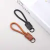 Llavero de Teléfono con Correa de Cuero PU de Colores, Estilo Corto, Colgante Tejido de Mano, Correa de Muñeca Portátil Duradera y Resistente al Desgaste