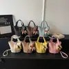 Bolso de mano de verano para mujer 2026 nueva moda coreana de nicho tipo cubo bolso bandolera súper popular
