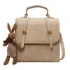 Bolsa de Crowdsourcing Pequena com Senso de Design Feminina 2024 Mochila Versátil Portátil Estilo Coreano Mochila Escolar Mochila de Viagem Retrô