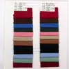 Mengzhige en stock 100% algodón tejido para jóvenes hilo teñido en masa material para camisas accesorios de ropa tela al por mayor
