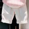 Ropa infantil coreana 2026 primavera y otoño nuevo conjunto de suéter de punto con cuello polo a rayas rosas y pantalones casuales blancos
