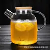 Jarra de Agua Fría de Alto Borosilicato Transparente para Té de Frutas, Resistente al Calor con Tapa de Acero y Bambú, Jarra de Agua Fría Personalizada del Fabricante, Venta al Por Mayor en Stock