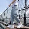 Jeans Cropped Masculino Elástico na Cintura Solto para Todas as Estações Calças Harem Casuais Cor Clara Marca Tendência