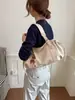 Nova bolsa de ombro vintage com cordão para mulheres, bolsa de mão para o dia a dia de grande capacidade, bolsa de ombro simples e versátil com textura de couro genuíno