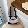 La popular bolsa de gran capacidad para mujer de este año, nueva y elegante bolsa de hombro informal de verano 2026, bolso tote texturizado para el trabajo
