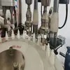 Linha de produção automática de enchimento de loção 60ml Máquina de envase e tampagem para colírios 10ml Equipamento de enchimento para gotas de pet