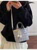 Bolso pequeño popular transfronterizo para mujer Verano 2025 Nueva moda a cuadros Bolso bandolera Estilo coreano Bolso de cubo portátil
