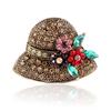 Estilo popular caliente europeo y americano fuentes de mercancía transfronteriza deseo AliExpress venta caliente ropa creativa linda broche de sombrero completo de diamantes
