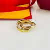 Tarjeta directa de fábrica más anillo de tres anillos chapado en anillo de tres anillos anillo tricolor anillo de pareja joyería de mano para mujer moda europea y americana