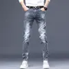 Novos Jeans Brancos de Outono 2026 de Alta Qualidade para Homens, Corte Slim, Calças Brancas Novas Estilosas para Homens com Rasgos, Tendência