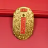 Venta directa de fábrica de nuevos dijes, colgantes, llaveros y pequeños accesorios de metal con diseño de gota de aceite color dorado "Hazte Rico" al por mayor