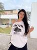Playera Top de Manga Corta con Hombros Inclinados y Estampado de Letras Fuera del Hombro Algodón Puro Manga Corta Camiseta Mujer Fuera del Hombro Marca de Moda de Hong Kong Verano
