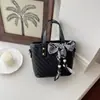Bolso de moda para mujer estilo coreano Shuai Mijia, nuevo modelo 2026, bolso cruzado pequeño con textura de alta calidad, gran capacidad, bolso de mano de moda tipo cubo