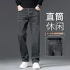 Jeans de alta gama para hombre de primavera y otoño, corte recto holgado, pantalones para hombre de mediana edad, nuevos pantalones largos de algodón elástico para hombre de otoño 2026