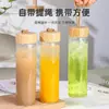 Comercio exterior 16 oz boca ancha cuerda para levantar tapa de bambú taza de silicona anti-quemaduras juego de tazas resistente a altas temperaturas capa única vidrio de borosilicato alto taza de agua portátil