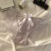 Venda Direta de Fábrica Transfronteiriça Nova Tanga Sexy de Renda com Laço Verão Fina Vazada de Cintura Baixa Roupa Íntima Feminina