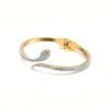 Nueva pulsera creativa de serpiente de acero de titanio con incrustaciones de diamante flash personalidad pulsera de mujer galvanoplastia pulsera de oro de 18 quilates joyería al por mayor