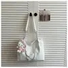 Bolsa tote de gran capacidad para estudiantes mujeres, adecuada para la escuela y el trabajo, diseño de nicho elegante, bolso de hombro casual