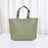 Bolsas no tejidas en stock con cierres de broche de ángulo recto, bolsas tipo tote con fondo pero sin lados, bolsas de compras y bolsas tipo tote no tejidas con impresión personalizada
