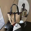 Bolso de paja tejido para mujer verano 2026 nuevo versátil de un solo hombro cruzado bolsa de playa para vacaciones bolso de mano bolso cubo