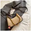 Bolsa de axila estilo vintage francês, nova bolsa de corrente para o início do outono de 2026, bolsa de ombro e transversal, bolsa de mão única e estilosa