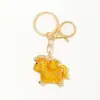 Pequeño Regalo de Año Nuevo Estilo Chino Caballo que Trae Fortuna Llavero con Corazón de Metal Perlado y Cordón de Cuero Colgante para Llave