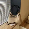 Bolso de hombro estilo retro para mujer, perfecto para exportación, con un aspecto sofisticado, diseño versátil y múltiples usos como mochila o bolso cruzado, hecho de gamuza