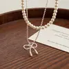 Colar Pingente de Laço Duplo com Pérolas Doce e Elegante para Mulheres, Estilo de Luxo Leve de Nicho, Corrente de Clavícula de Alta Qualidade
