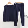 Traje cálido de parche grueso para hombre de otoño e invierno, cuello redondo, sin marcas, cálido para el abdomen y las rodillas, talla grande, conjunto de dos piezas de otoño