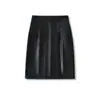 Ap25662-25 Nuevo Estilo Otoñal Estilo Europeo y Americano Sexy Pura Sexy Hermosa Abertura en la Entrepierna Cubre Cadera Falda de Cuero