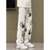 Calça Jeans Flare Vibe Americana para Homens Outono 2025 Calça Estampa de Palmeiras Marca Tendência Streetwear Cool High Street Calça Longa
