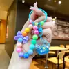 Llavero de Patita de Gato con Arena Líquida y Cuentas Colgante para Mochila de Estudiante Decoración para Llavero de Coche Muñeco Máquina Regalo Pequeño Venta al por Mayor