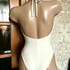 Traje de baño de una pieza azul con estampado floral de retazos, cuello halter y escote en V profundo para mujer, adelgazante y que realza la figura, trajes de baño para vacaciones en la playa al por mayor 2026